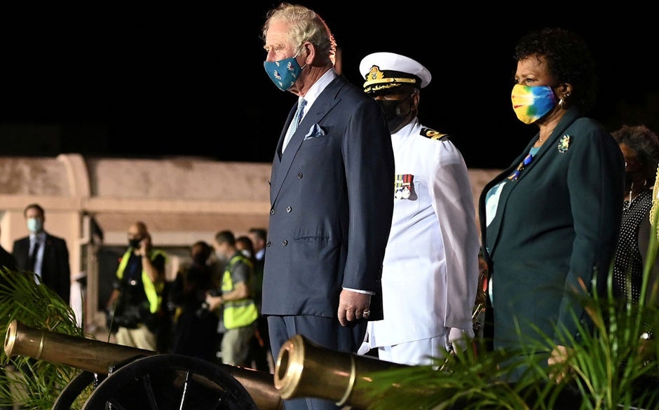 Britain’s Prince Charles stands with Barbados’ President-elect Sandra Mason during a Guard of Honour and playing of national anthems, as he arrives at Grantley Adams Airport, to take park in events to mark the Caribbean island’s transition to a birth of a new republic, Bridgetown, Barbados,