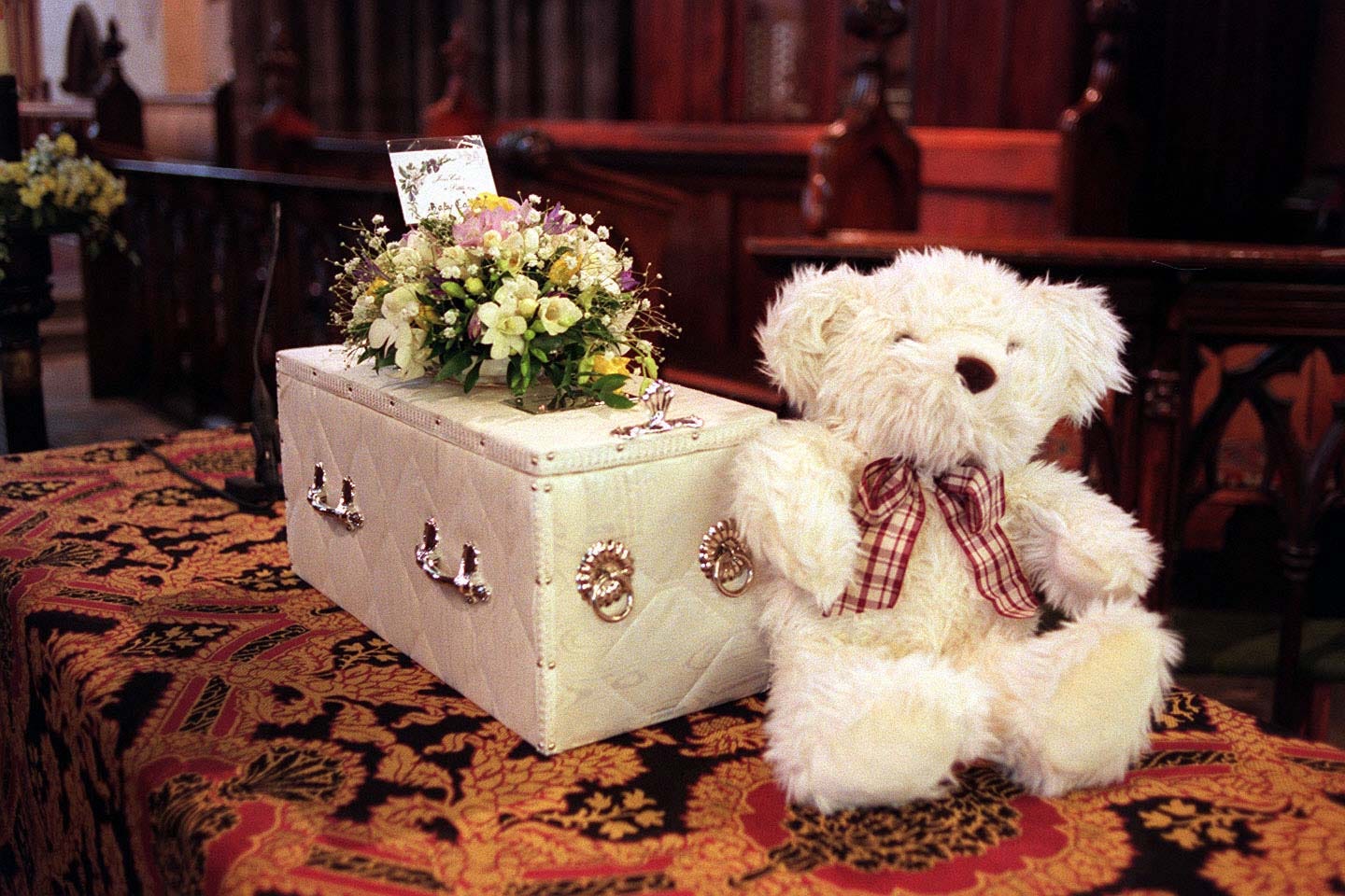 The coffin of abandoned baby Callum during his funeral service in 1998