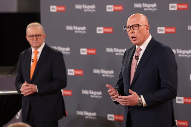 <p>Opposition leader Peter Dutton gestures as Australian Prime Minister Anthony Albanese, left, watches during their TV debate in Sydney, Australia, </p>