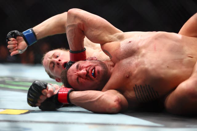 <p>Paddy Pimblett (left) controlled Michael Chandler at times and rained down heavy strikes </p>