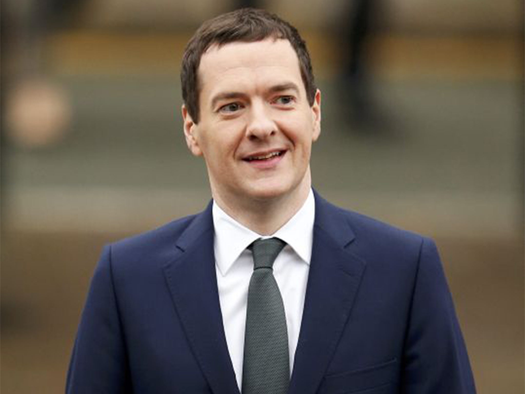 George Osborne walks to the venue on the fourth day of the Conservative Party Conference in Manchester