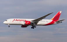 Four taken to hospital after plane plummets during turbulence
